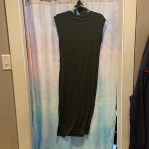 Formfitting, long, short sleeve, dark green dress comes with belt